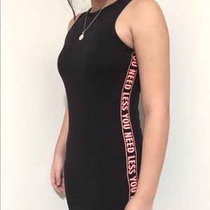 black dress “you need less” clockhouse